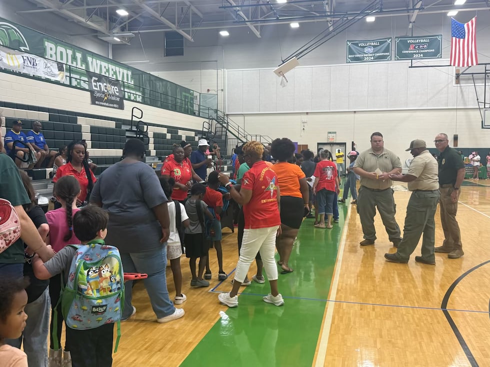 Backpacks and school supplies were handed out during the Back-to-School Jamboree, along with...