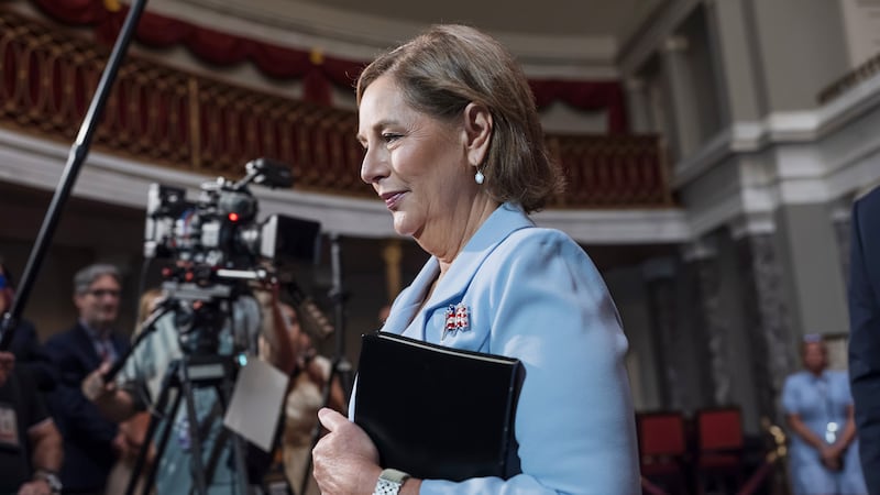Newly-sworn Sen. Darline Graham, R-S.C., sister of Lindsey Graham, walks past cameras as she...