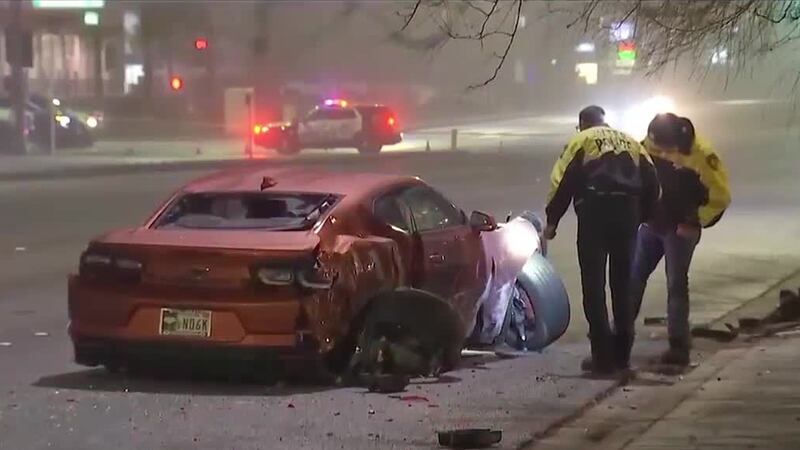 A woman is dead and two others are injured after two racing vehicles crashed in Las Vegas .