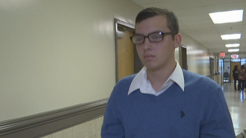 Fisher Shipes is led from a Houston County Courtroom after a judge sentenced him to 14 years...