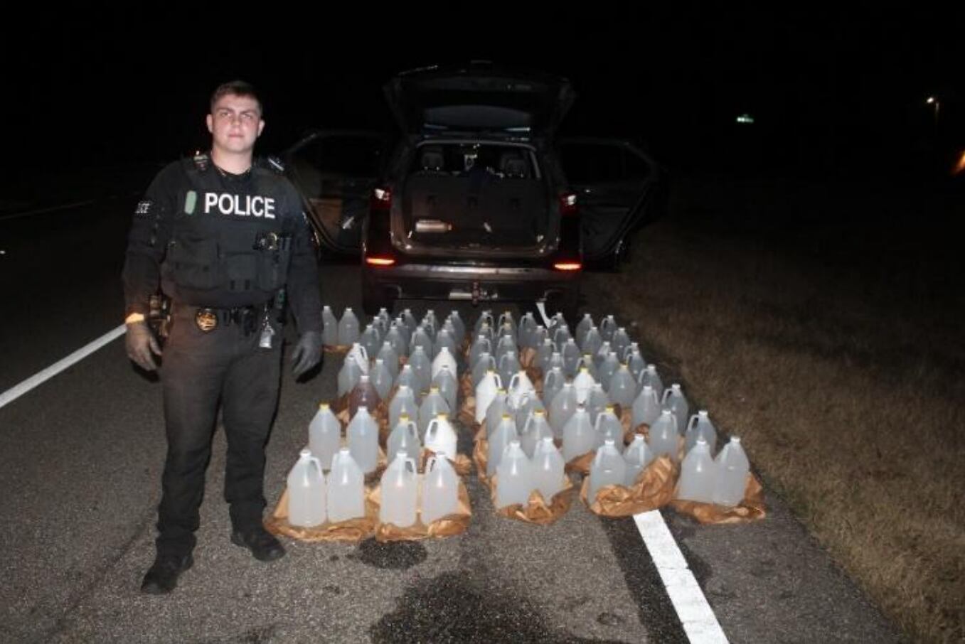 Over 80 gallons of moonshine seized in Ozark traffic stop
